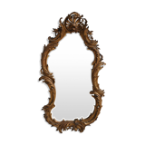 Miroir en stuc doré rocaille époque XIXème 110cm