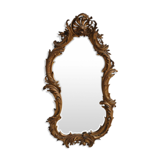 Miroir en stuc doré rocaille époque XIXème 110cm