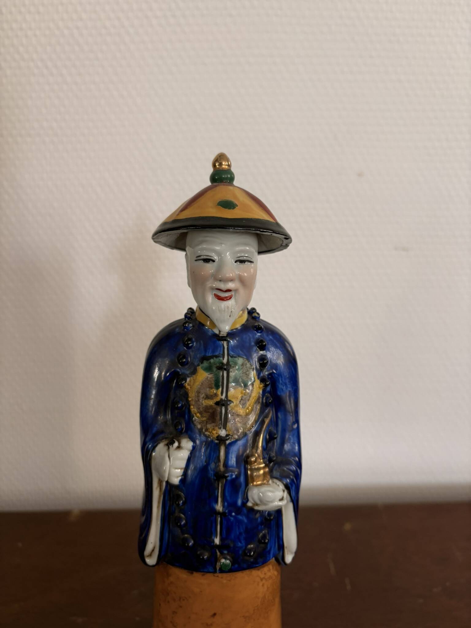 Chinese Porcelain Sculpture of a Manchu Mandarin Qing Pipe Smoker
