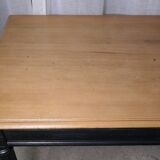 Console noire et bois brut