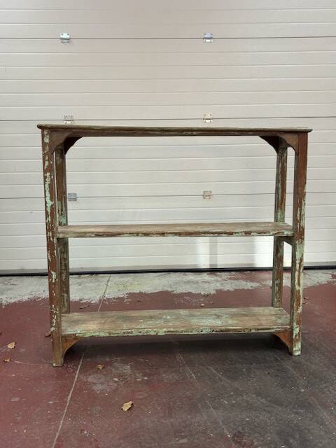 Teak shelves with a green patina