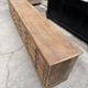 Large workshop furniture transformed into a TV unit.