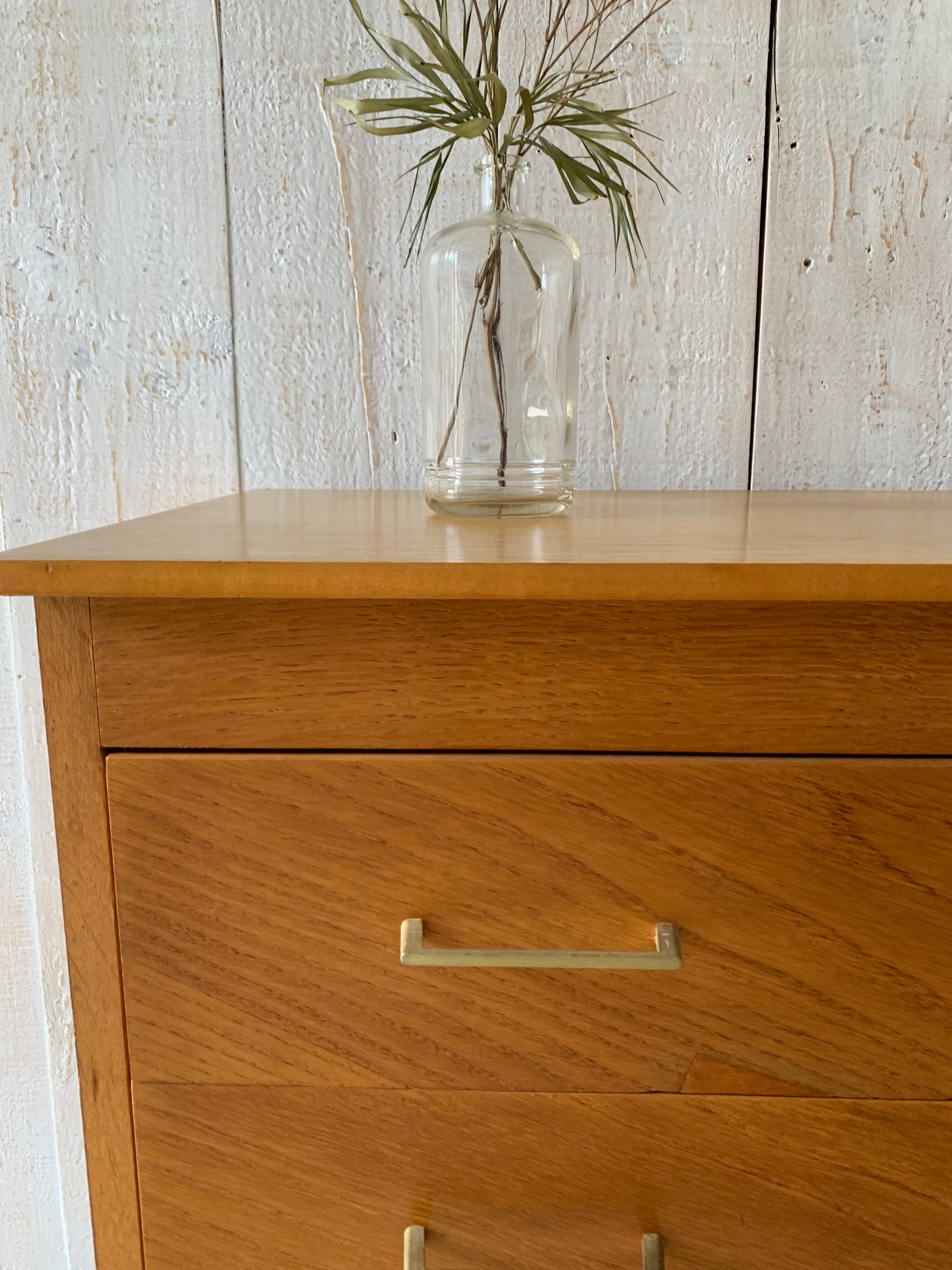 Chest of drawers with compass feet