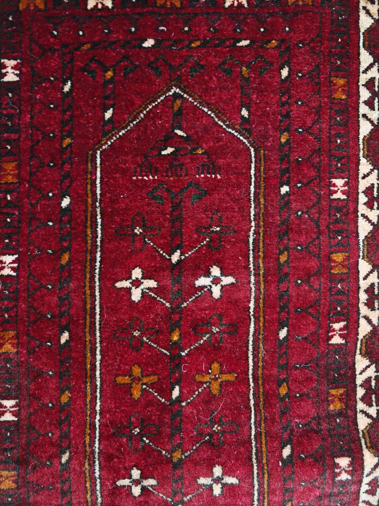 Vintage Afghan tribal prayer rug, hand-knotted from the 1950s.