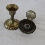 Small golden metal candle holders