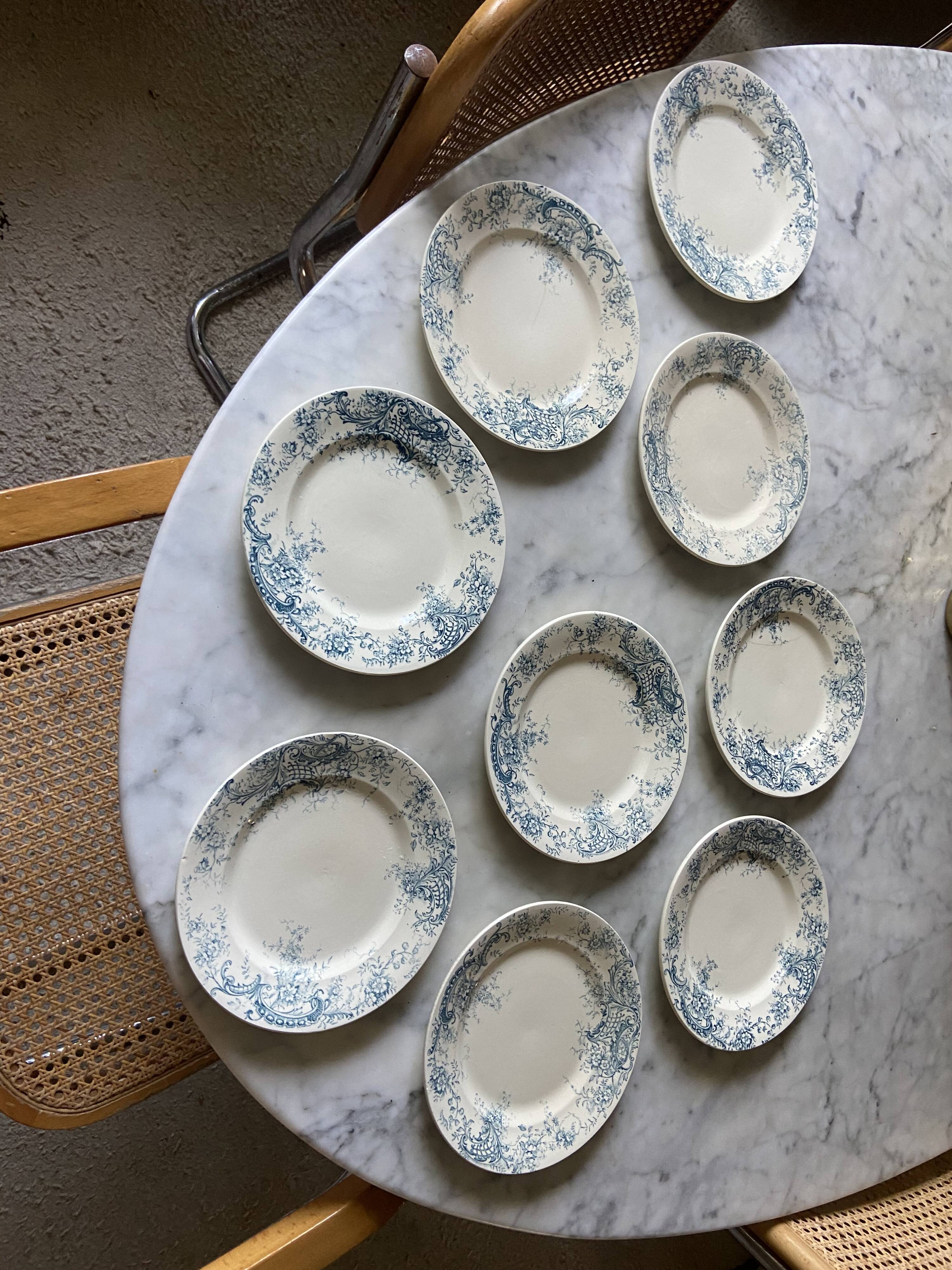 Series of 9 vintage iron earth plates