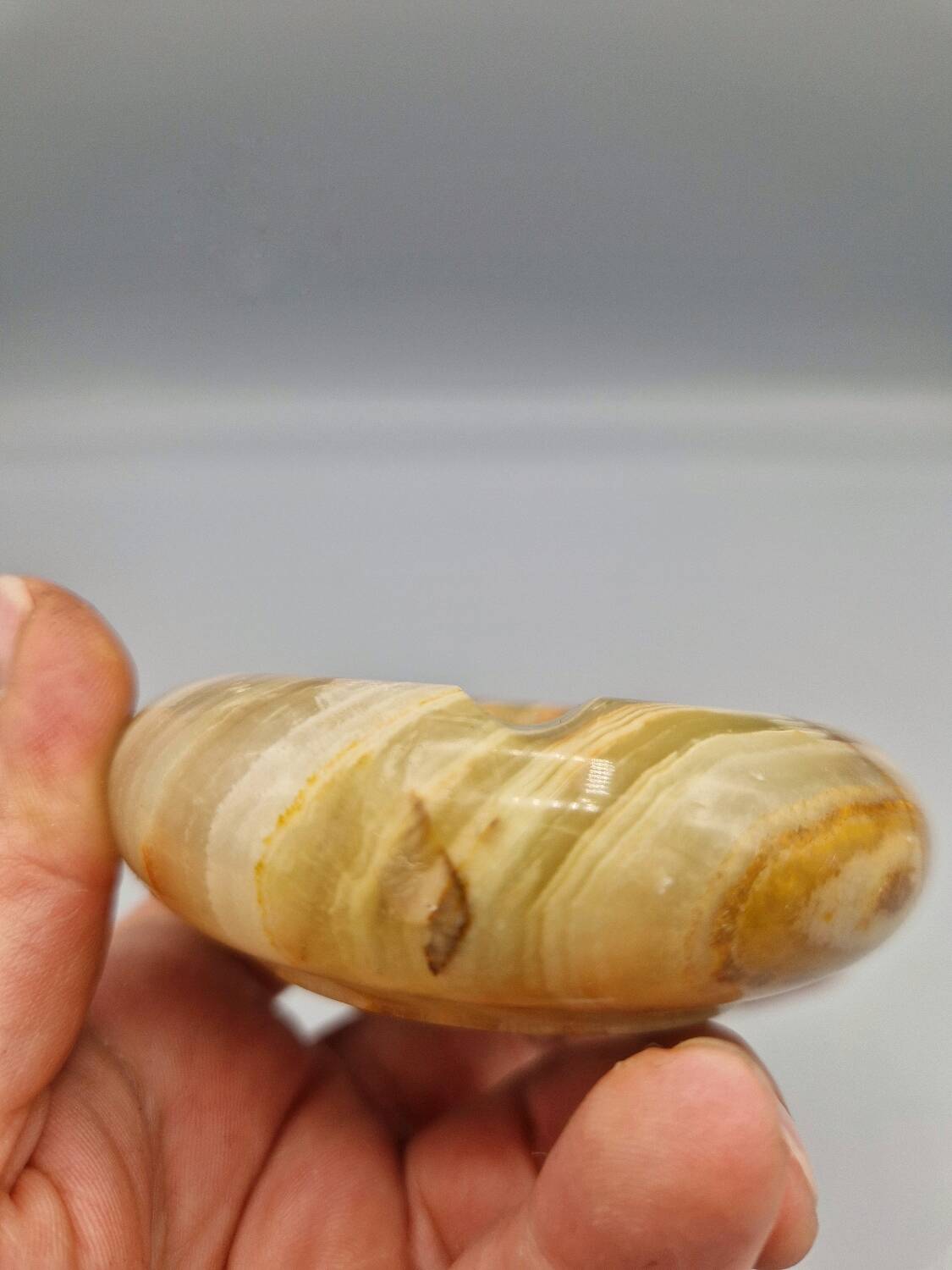 Small vintage onyx ashtray with three rests