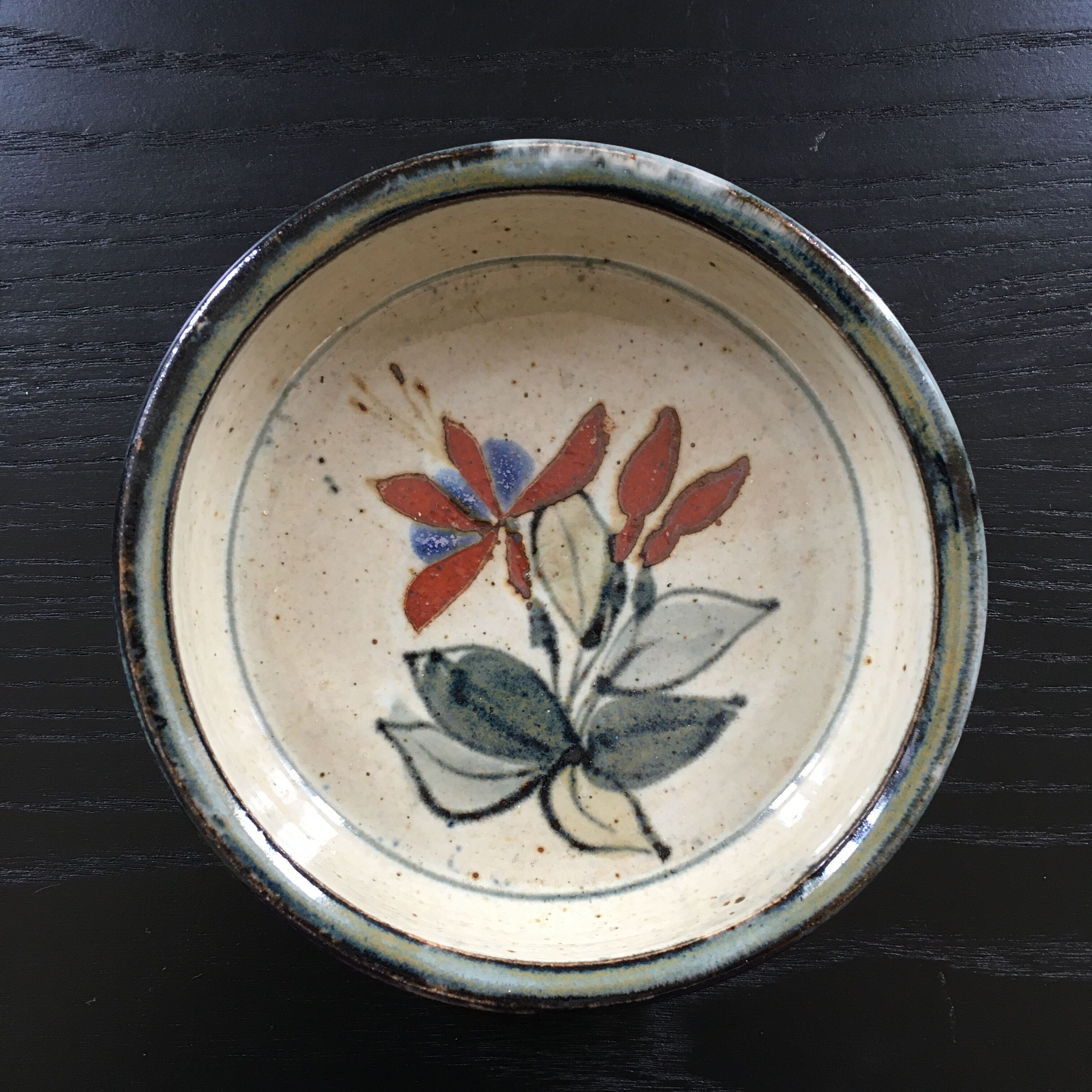 Floral decorated ramekin, signed