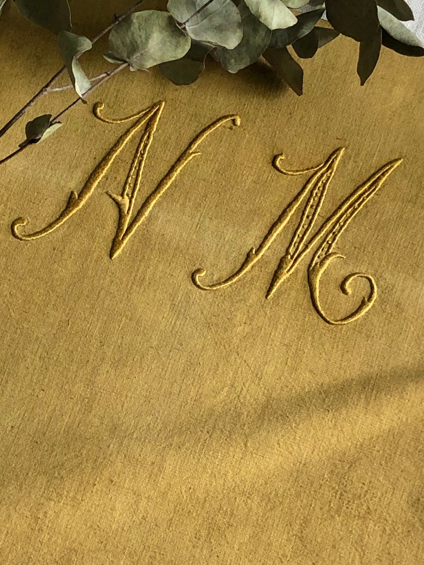 Old linen and cotton sheet embroidered and tinted in Indian yellow