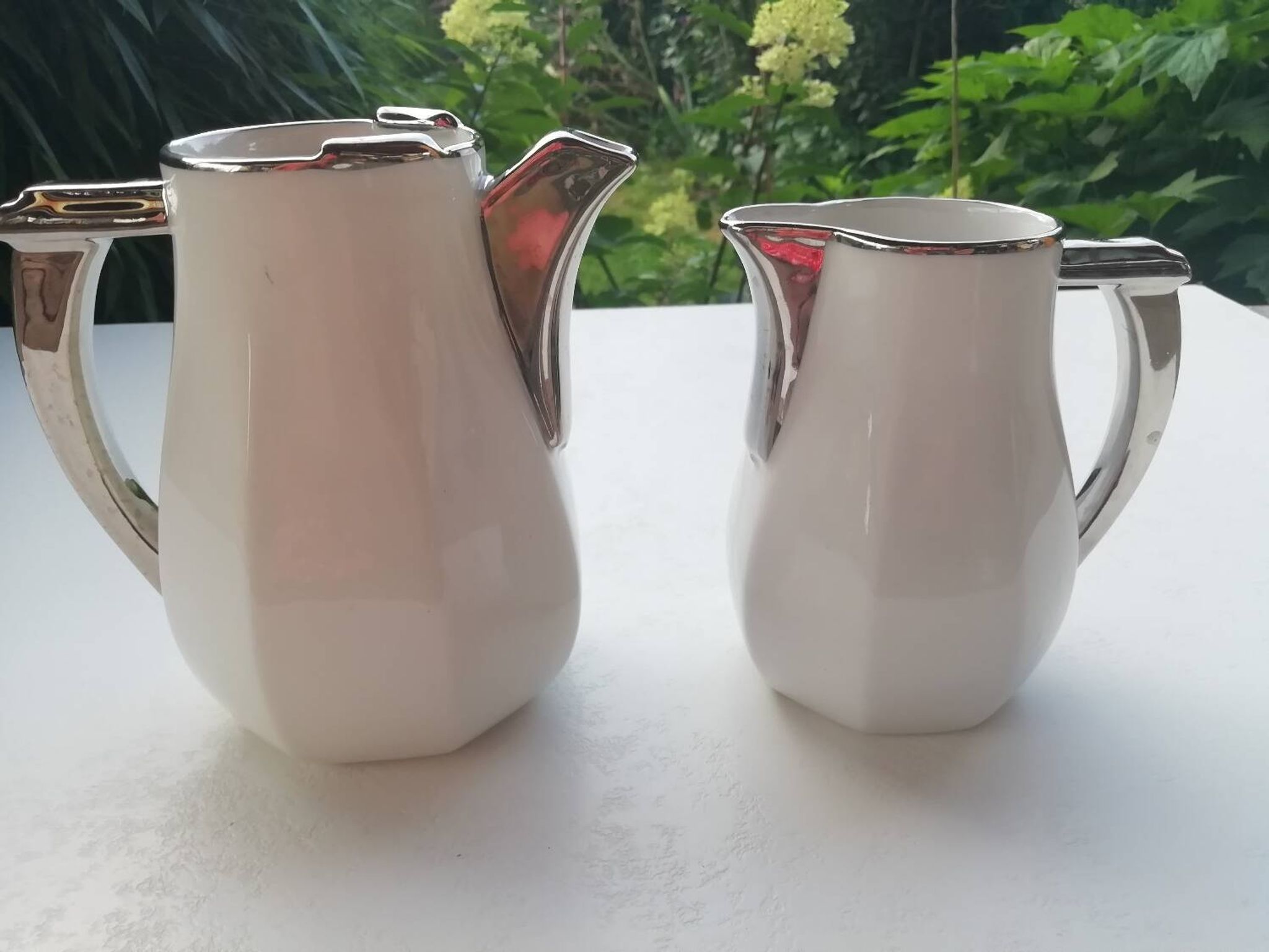 Pair of milk jug teapots