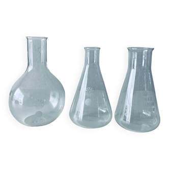 Set of three Pyrex glass chemistry bottles