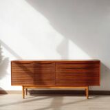 Vintage zebrano and walnut furniture from Morris of Glasgow.