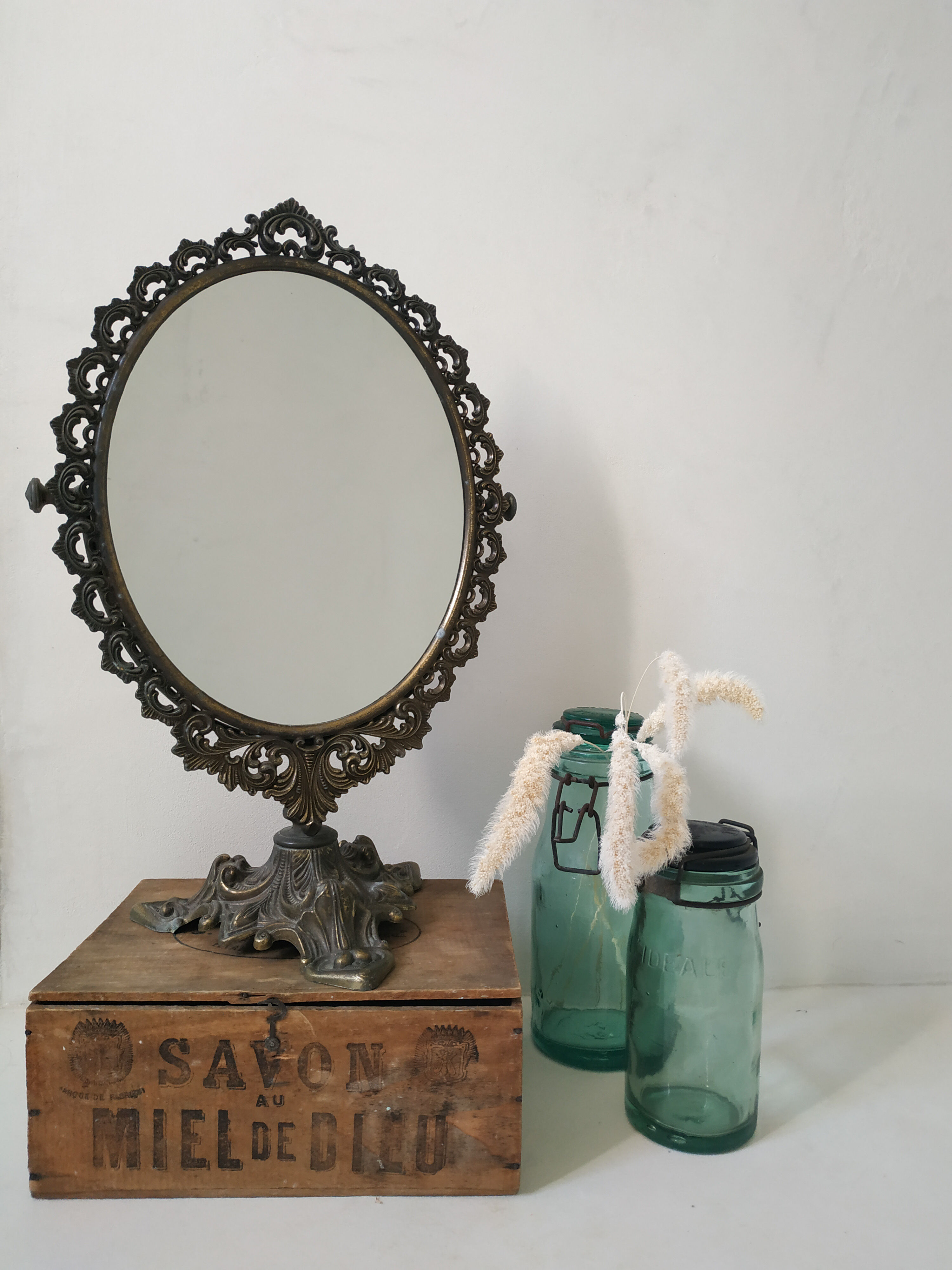 Old mirror on foot metal 30x46cm