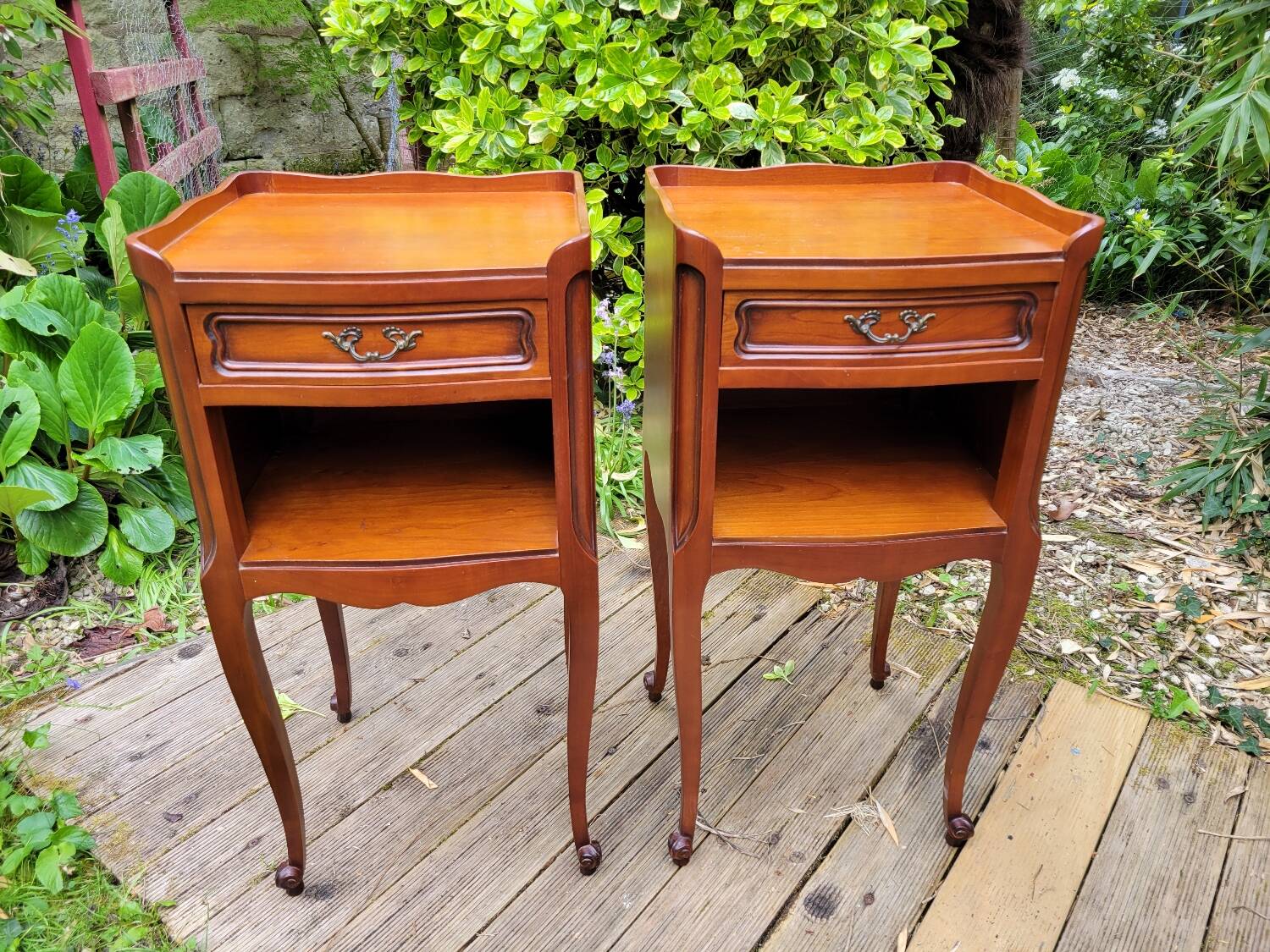 Pair of Louis XV bedside tables in cherry wood.