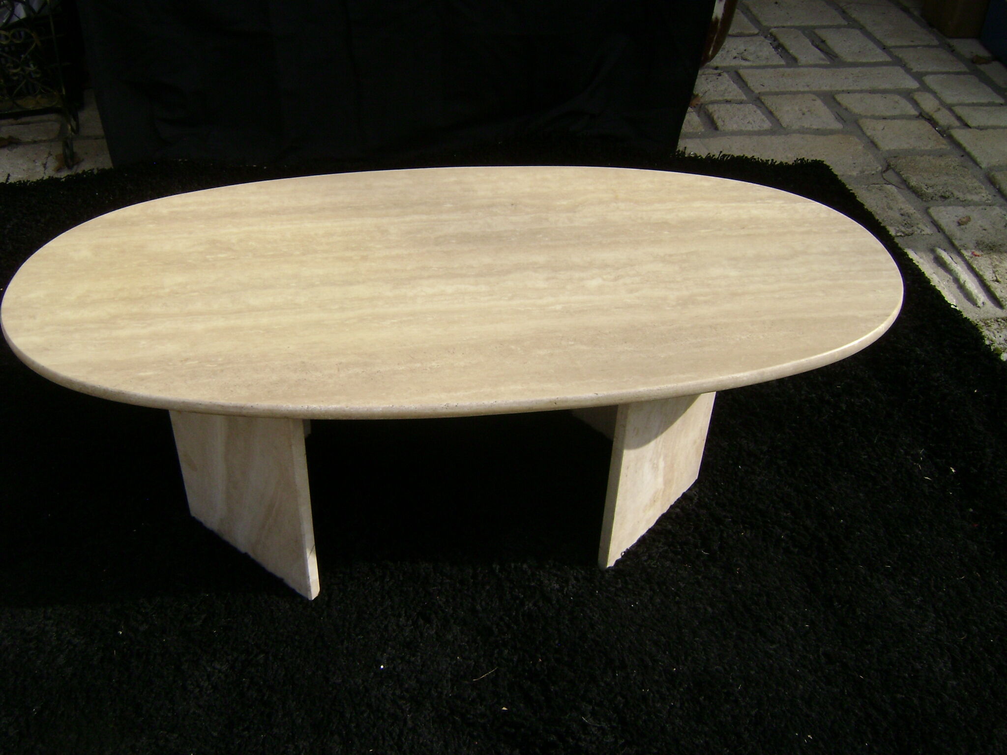 Oval coffee table in travertine italy from the 1970s