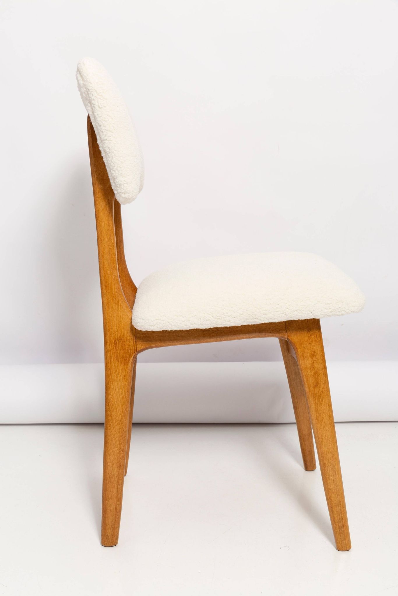 Mid-century "Butterfly" dining chair, light cream boucle, Poland, 1960s