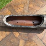 Lot of sandstone planter in the shape of logs