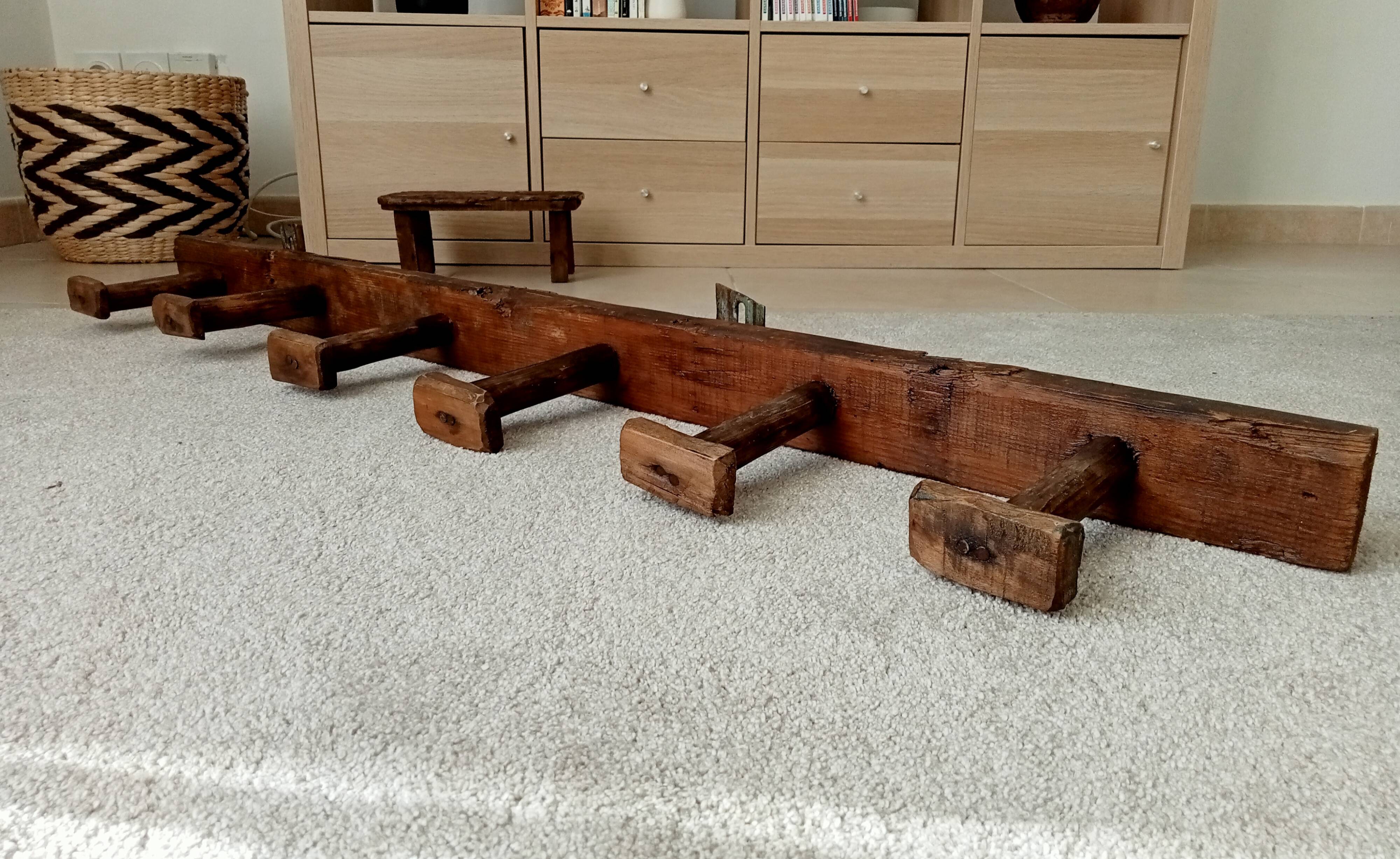 Old wall-mounted coat rack from a stable, folk art.
