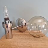 Pair of vintage wall lights in chromed metal and smoked glass, 70s
