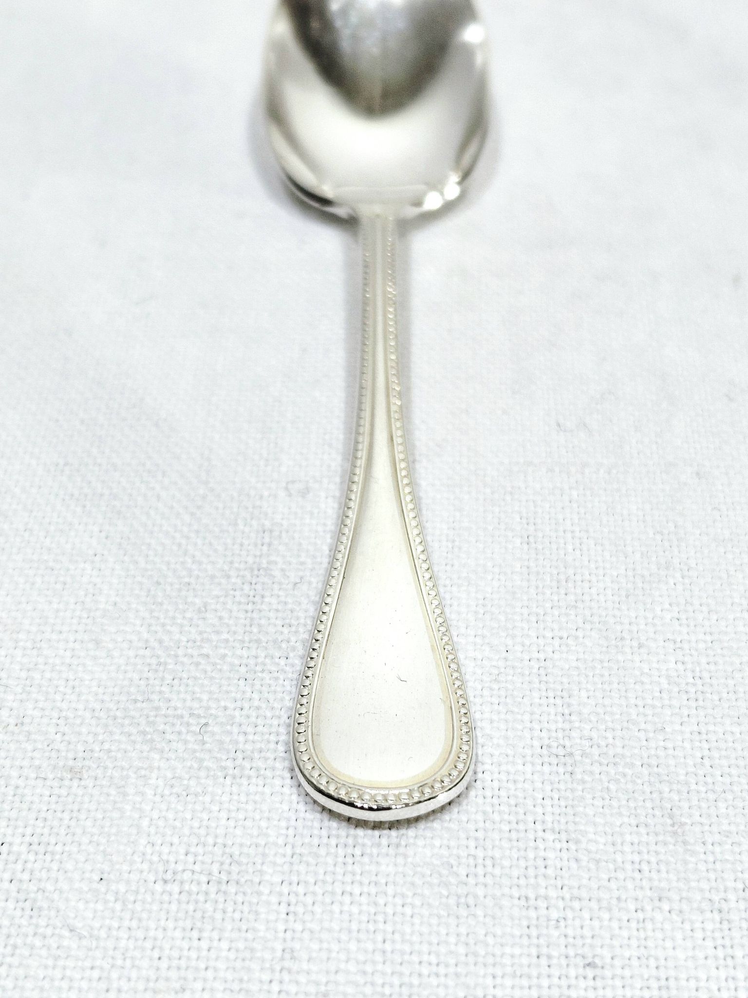 Christofle - 12 cuillères à Moka Perles