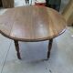 Round kitchen table with shutters in solid oak, 1900