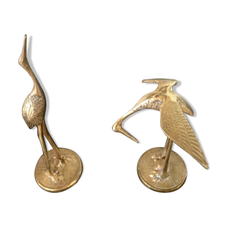 Couple of herons in brass