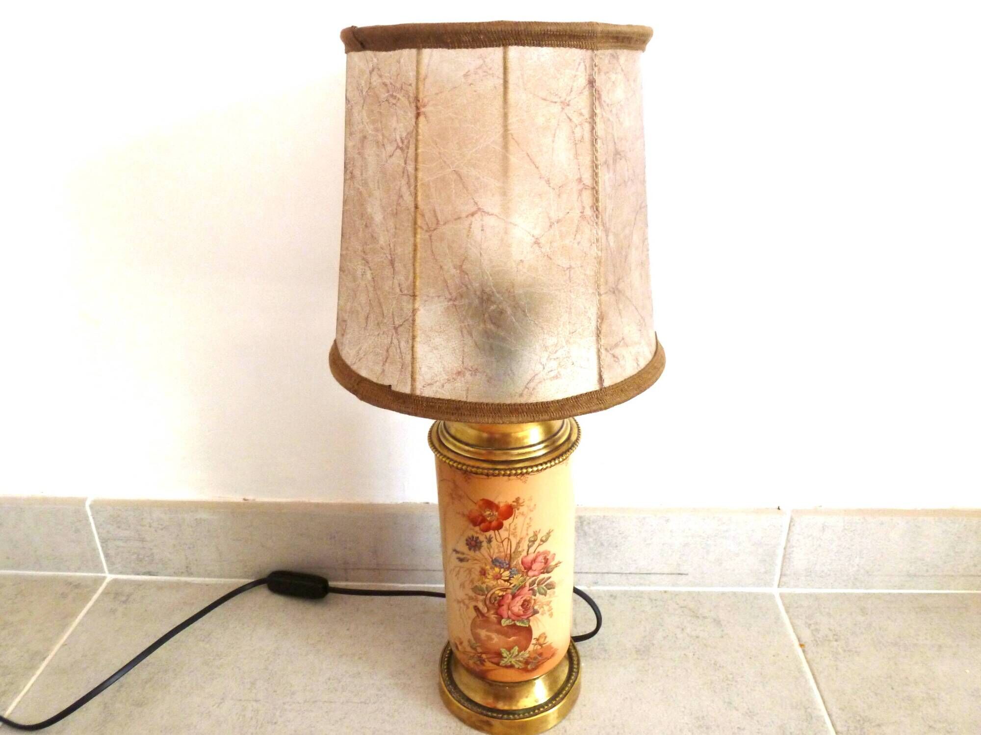 Old ceramic lamp "Lunéville" with a pig bladder shade.