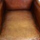 Set of 2 subtle sheepskin leather armchairs with a beautiful warm color scheme