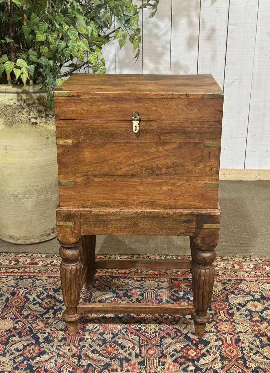 Teak bottle cabinet on legs in marine style