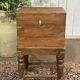 Teak bottle cabinet on legs in marine style