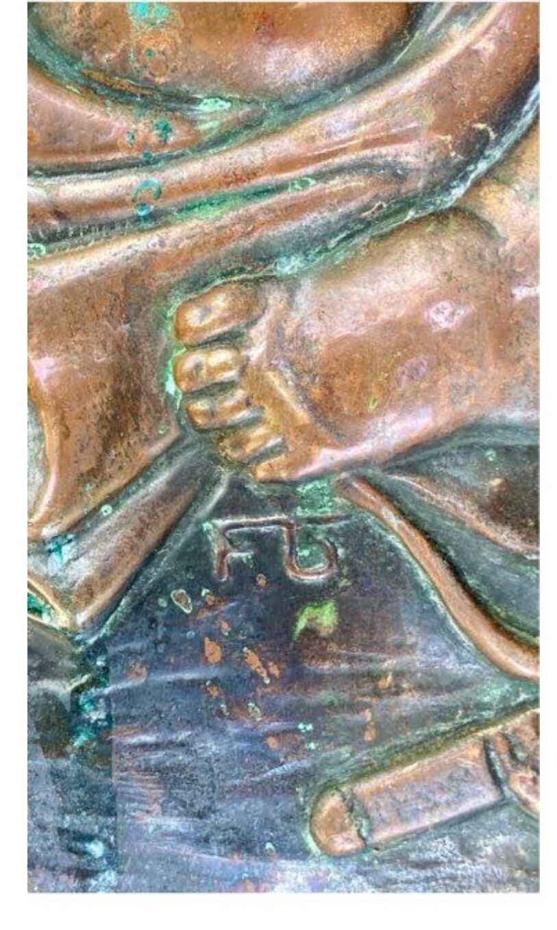 Antique red copper umbrella stand decorated with putti angels.