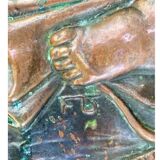 Antique red copper umbrella stand decorated with putti angels.