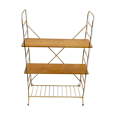 Golden thong shelf on vintage stand