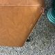 Fauteuil vintage en skaï camel