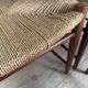 Danish vintage chairs in teak and cord by Peter Hvidt