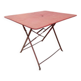 Old folding iron garden table.