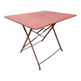 Ancienne table de jardin en fer pliante.