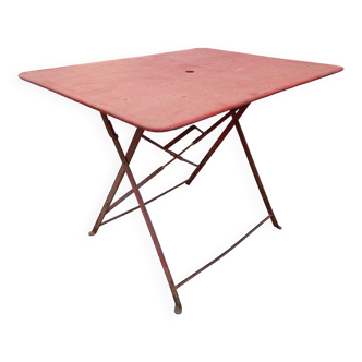 Old folding iron garden table.