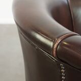 dark cowhide club chair in English style
