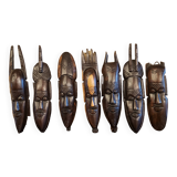 7 weekly African masks in carved wood