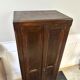 Parisian cabinet man standing