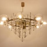 Large chandelier in gilded brass with decorative balls. 1970s.
