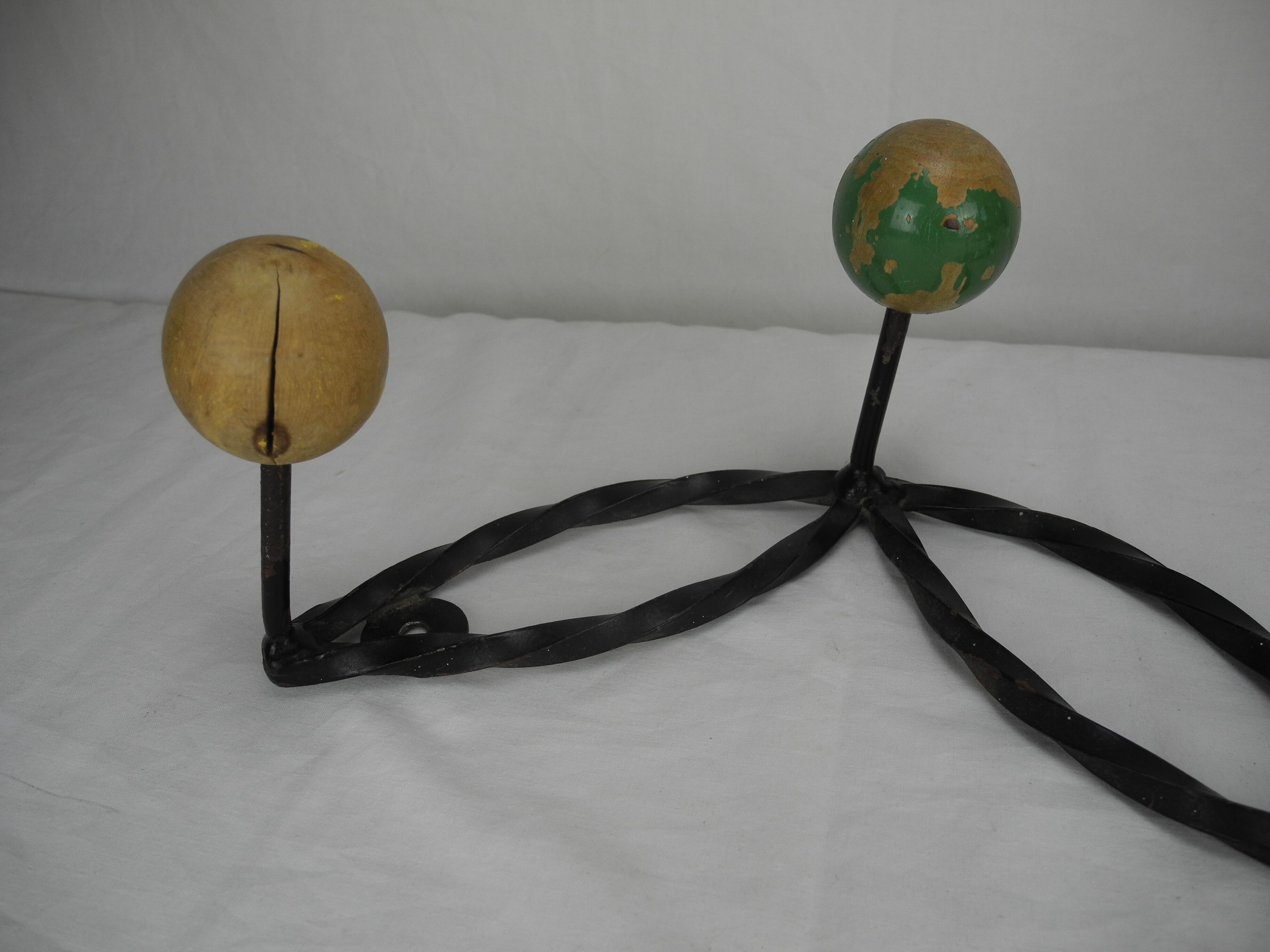 Old wrought iron coat rack