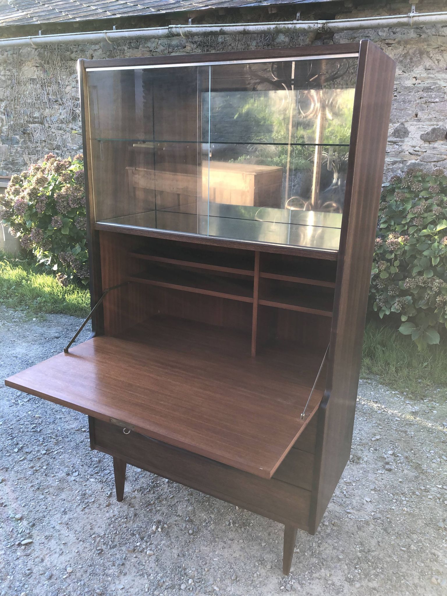 Vintage Scandinavian secretary in rosewood with drawers featuring fin-style handles.