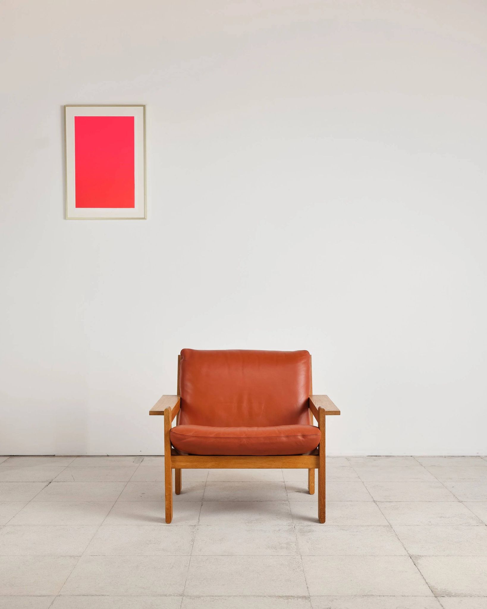 Brutalist armchair in oak and leather by Tage Poulsen, Denmark, 1970s.