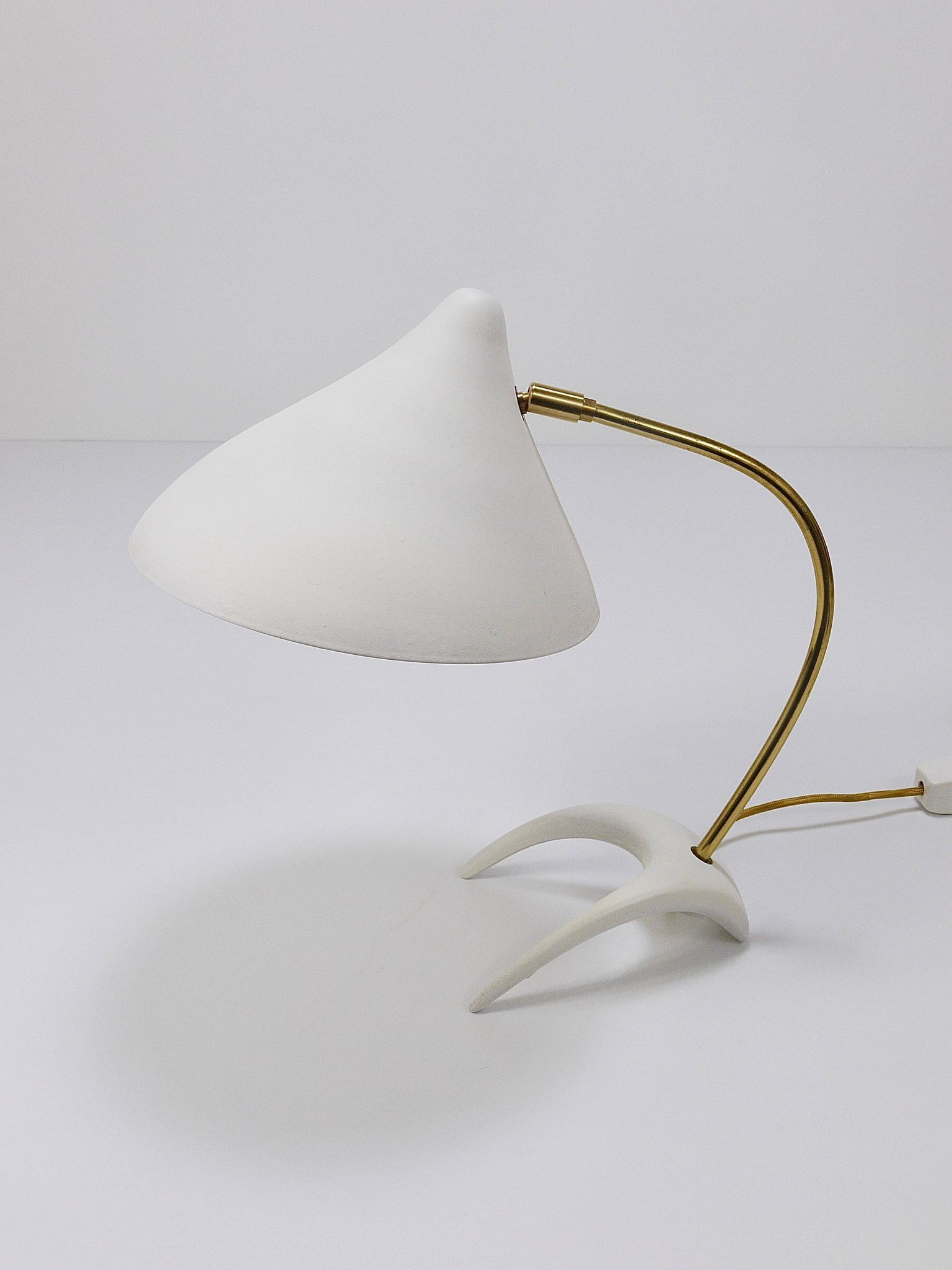 White brass desk or table lamp in the Louis Kalff style from the 1950s.