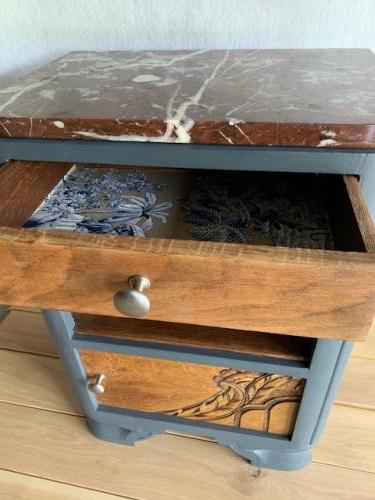 Wooden bedside on art deco marble