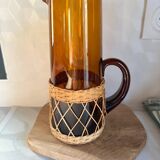 Vintage orange and wicker carafe