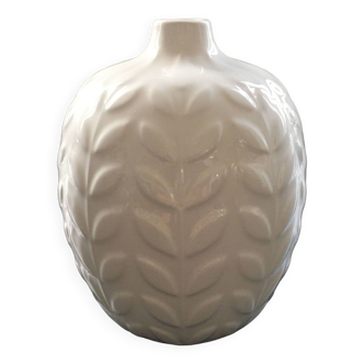 White vase with ear of corn decor