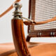 Walnut armchair with bamboo design